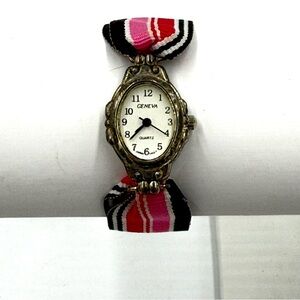 Vintage Geneva Silver Tone Water Resistant Watch with Multicolor Striped Band